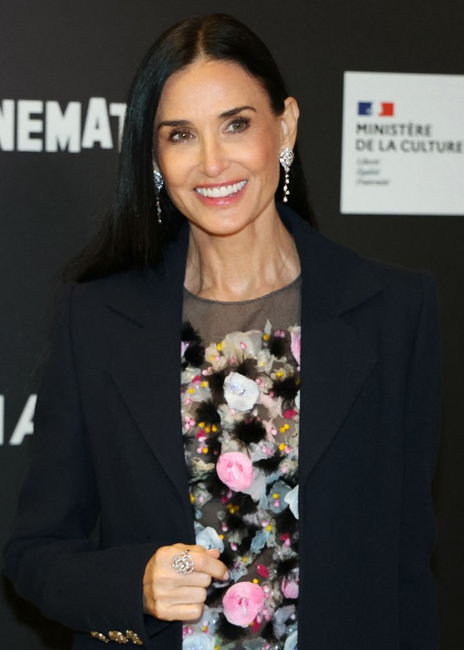 Demi Moore se na filmsko platno vrača v velikem slogu. Foto: Alain Jocard/Afp