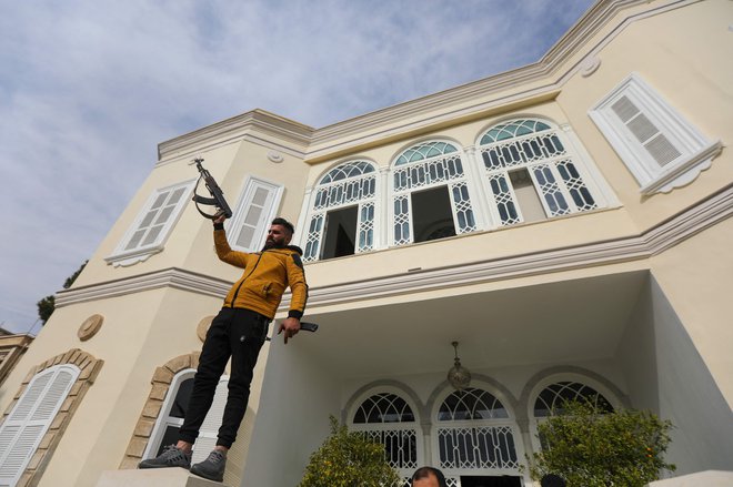 V Siriji številni slavijo. FOTO: Bakr Al Kassem Afp