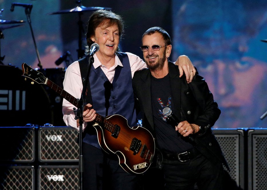 Fotografija: Paul McCartney in Ringo Starr le redko nastopata skupaj; posnetek je s podelitve grammyjev leta 2014. FOTO: Mario Anzuoni/Reuters