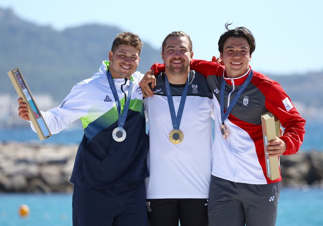 Toni Vodišek je postal dobitnik srebrne olimpijske medalje na letošnjih olimpijskih igrah in prve za Slovenijo v disciplini formula kite. FOTO: Andrew Boyers Reuters