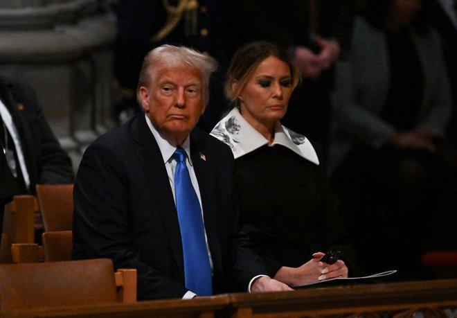 Zakonca Trump sta bila videti zamišljena. FOTO: Ricky Carioti Via Reuters