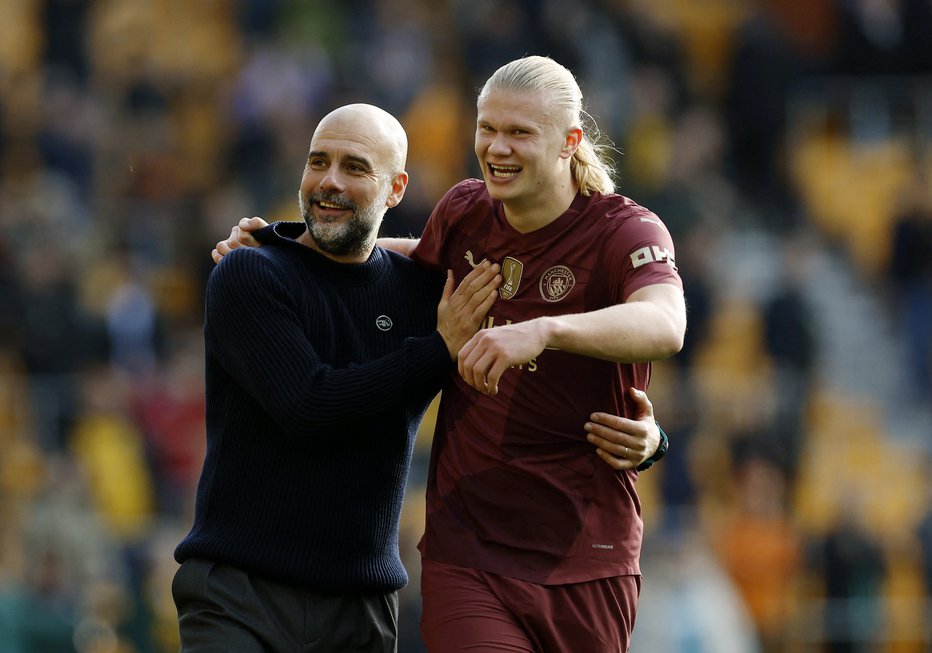 Fotografija: Pep Guardiola in Erling Haaland bosta nadaljevala plodno sodelovanje v Manchestru. FOTO: Jason Cairnduff/Reuters