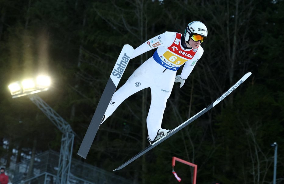 Fotografija: Domen Prevc se že zelo veseli prvih poletov. FOTO: Kacper Pempel/Reuters