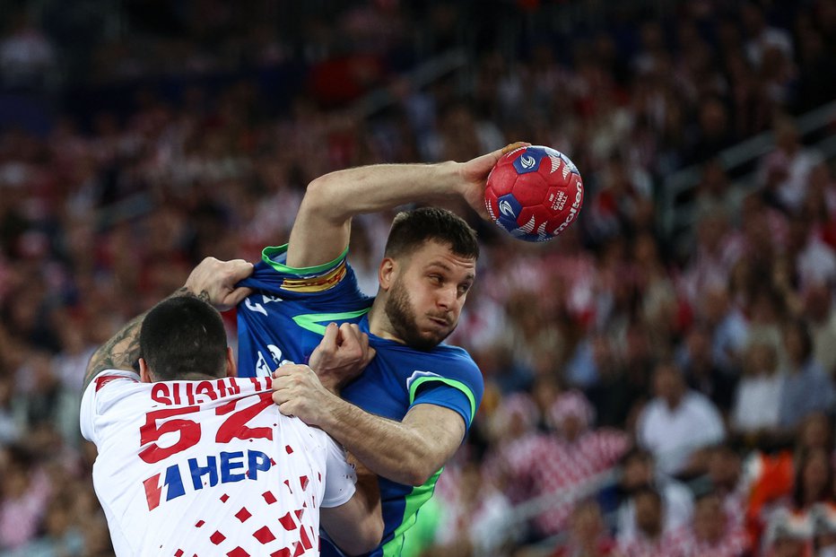 Fotografija: Hrvaški rokometaši so ustavili slovenske. FOTO: Anne-christine Poujoulat Afp